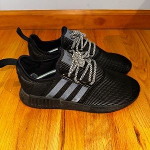 Adidas NMD triple black with reflective laces